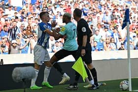 Brighton midfielder Solly March clashes with Newcastle United's Brazilian striker Joelinton during the stalemate at the Amex Stadium