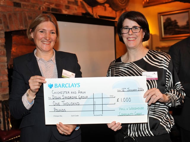 Judge Susie Rees presents a cheque for £1,000 to Chichester & Arun Down Syndrome Group