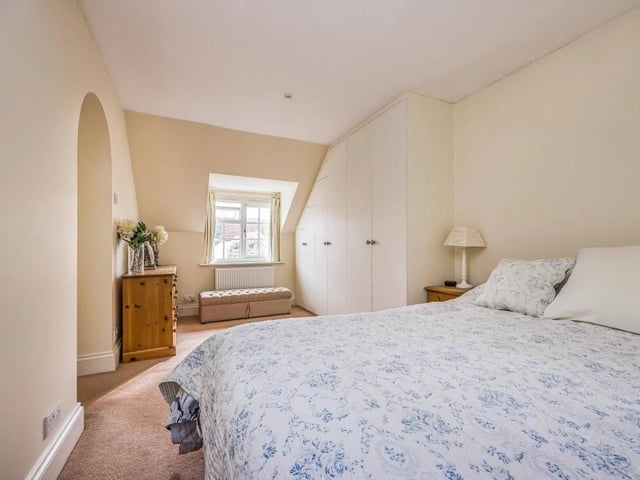 One of the property's three generously proportioned bedrooms.