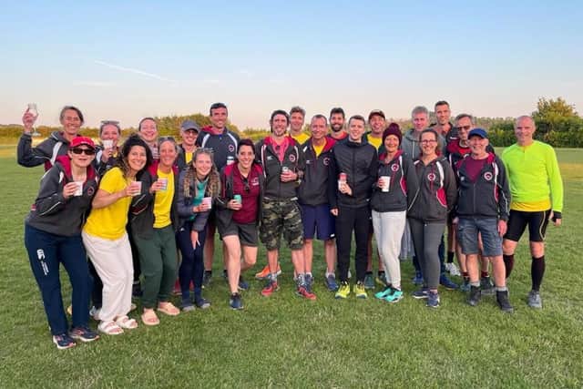Celebrating a job well done - the Harriers teams at the end of the South Downs Way Relay 2023