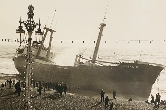 The ‘Athina B’ was making its way for Shoreham Harbour with a cargo of 3,000 tonnes of pumice from the Azores. On the 20 January 1980, force 7-8 winds prevented her from entering the harbour. Her engines failed: a Mayday call was issued. Lifeboats were launched from Shoreham, Brighton and Newhaven. Initially four of the ship’s passengers including the captain’s wife and children were rescued. It was the following night in force 8-10 winds that the last of the crew were rescued. The ship had run aground on Brighton beach between the Palace Pier and Banjo Groyne in the south westerly storm’s heavy surf. All 26 people aboard the ship were rescued without loss of life by Shoreham RNLI’s ‘Dorothy and Philip Constant’ and crew.For a time, the ‘Athina B’ became a popular tourist attraction with thousands making their way to Brighton beach to catch a glimpse of the stranded hulk. Such was the interest, enterprising individuals sought to make money from the unseasonal surge in visitors: even Volk’s Electric Railway ran trains outside of its usual summer operations for additional income. On February 21, exactly a month since the ‘Athina B’ was beaching, the tide swelled, and the ship was towed back out to sea. Eventually it was scrapped in Kent, but its anchor remains as a reminder of the event on the Brighton promenade.