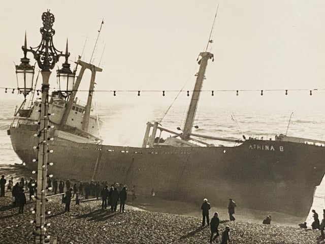 The ‘Athina B’ was making its way for Shoreham Harbour with a cargo of 3,000 tonnes of pumice from the Azores. On the 20 January 1980, force 7-8 winds prevented her from entering the harbour. Her engines failed: a Mayday call was issued. Lifeboats were launched from Shoreham, Brighton and Newhaven. Initially four of the ship’s passengers including the captain’s wife and children were rescued. It was the following night in force 8-10 winds that the last of the crew were rescued. The ship had run aground on Brighton beach between the Palace Pier and Banjo Groyne in the south westerly storm’s heavy surf. All 26 people aboard the ship were rescued without loss of life by Shoreham RNLI’s ‘Dorothy and Philip Constant’ and crew.For a time, the ‘Athina B’ became a popular tourist attraction with thousands making their way to Brighton beach to catch a glimpse of the stranded hulk. Such was the interest, enterprising individuals sought to make money from the unseasonal surge in visitors: even Volk’s Electric Railway ran trains outside of its usual summer operations for additional income. On February 21, exactly a month since the ‘Athina B’ was beaching, the tide swelled, and the ship was towed back out to sea. Eventually it was scrapped in Kent, but its anchor remains as a reminder of the event on the Brighton promenade.
