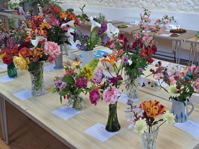 Floral exhibits included roses, sweet peas and fuchsias