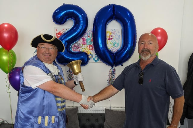 Frontline Associates Supported Tenancies celebrates the company's 20th anniversary and the first anniversary of the Frontline Hub, in Rowlands Road, Worthing, with a party for staff, service users and guests included Worthing town crier Bob Smytherman