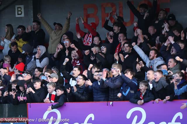 Crawley Town fans celebrate the win against Gillingham | Picture: Natalie Mayhew/Butterfly Football