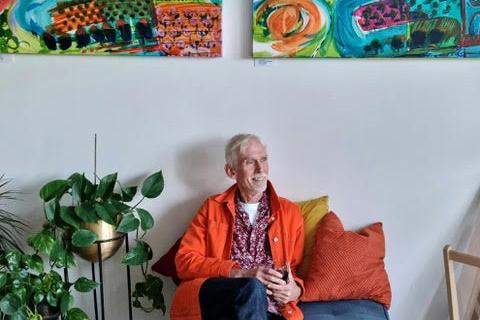 Rex Matthews with his paintings. Exhibition no. 71 - Lewes trail.