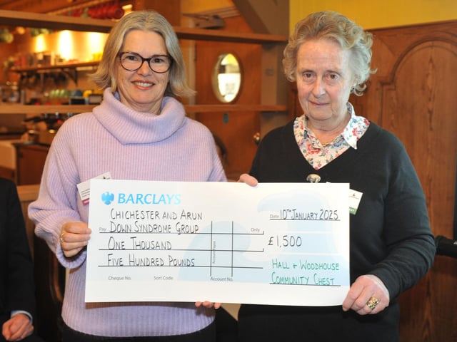 Chichester & Arun Down Syndrome Group, with judge Tessa Woodhouse, receiving £1,500 to fund speech and language therapy costs