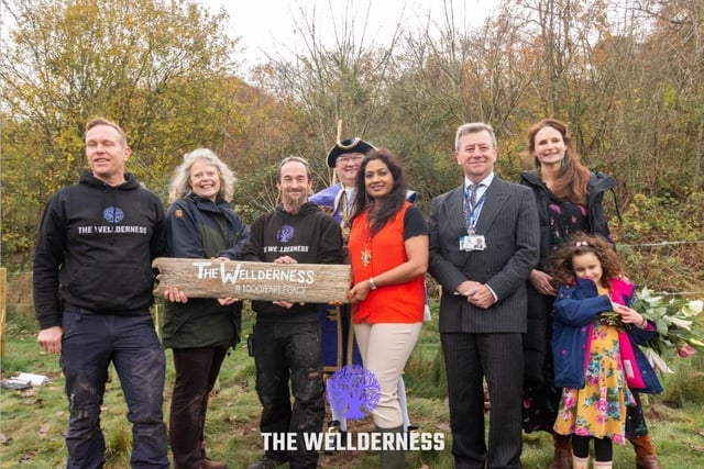 Lady Emma Barnard, Lord-Lieutenant of West Sussex, with The Wellderness founders Matt Dumbleton and Mark Cropley, Wild Heart Hill campsite owner Jose Lavelle, Worthing mayor Henna Chowdhury, town crier Bob Smytherman and Adur District Council chairman Andy McGregor