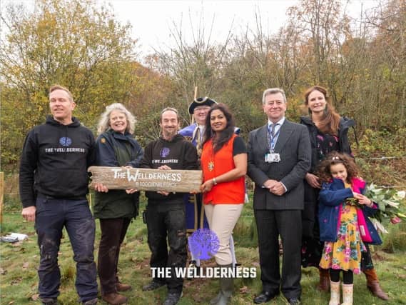 Lady Emma Barnard, Lord-Lieutenant of West Sussex, with The Wellderness founders Matt Dumbleton and Mark Cropley, Wild Heart Hill campsite owner Jose Lavelle, Worthing mayor Henna Chowdhury, town crier Bob Smytherman and Adur District Council chairman Andy McGregor