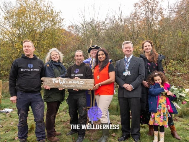 Lady Emma Barnard, Lord-Lieutenant of West Sussex, with The Wellderness founders Matt Dumbleton and Mark Cropley, Wild Heart Hill campsite owner Jose Lavelle, Worthing mayor Henna Chowdhury, town crier Bob Smytherman and Adur District Council chairman Andy McGregor