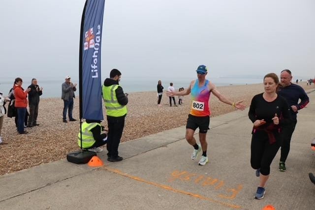 Action and finishers at the Seaford 10k