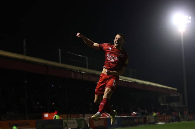 Charlie Barker of Crawley Town celebrates scoring a goal during the Crawley Town FC v Wigan Athletic FC - Sky Bet League One match at Broadfield Stadium on February 18, 2025 in Crawley, England. (Photo by Warren Little/Getty Images)