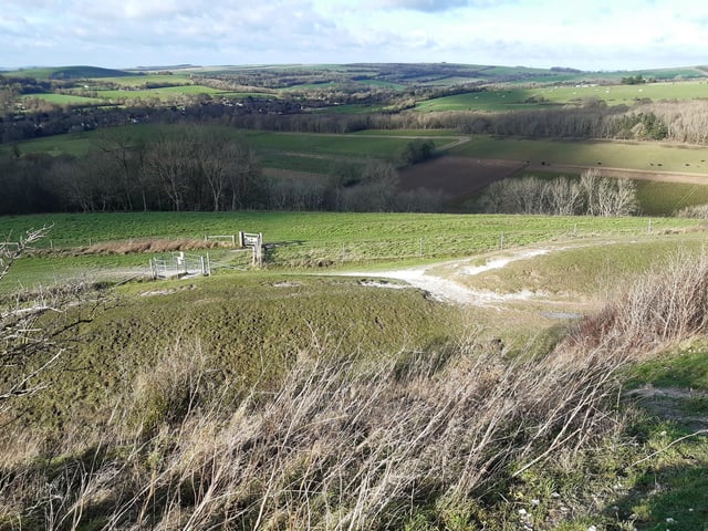 Now you are up, you can do a full circle, if you wish, and there are various ways back down. On our walk, we are looking out for the gate that takes you down to Storrington Rise. You will see the gate come into view but do not be tempted to take this steep slope straight down to it, as there are much better steps ahead, hidden from sight at this point.