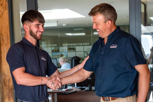 Kian Lambert with Managing Director James Parker.