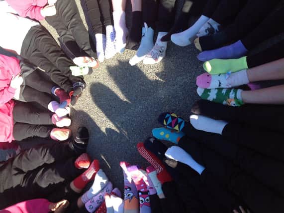 A selection of odd socks worn by the pupils at Heron Park Primary Academy to raise money for Children in Need.