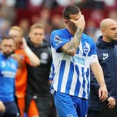 Lewis Dunk of Brighton & Hove Albion looks dejected at full-time following the Premier League loss at Aston Villa