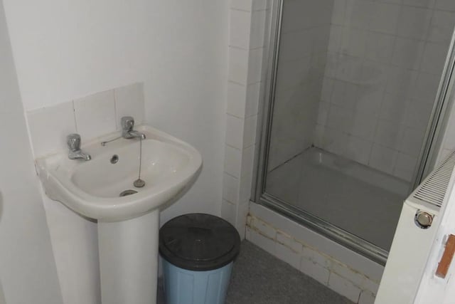 The shower room has a separate low-level WC