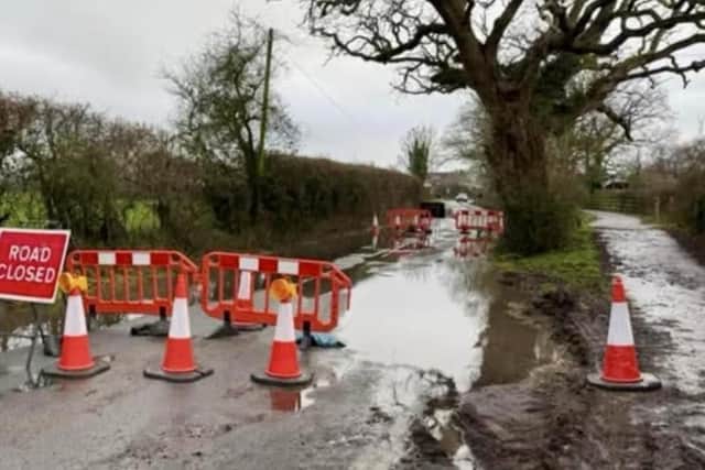 Storm Chandra: Flooding forces closure of West Sussex village road and ...