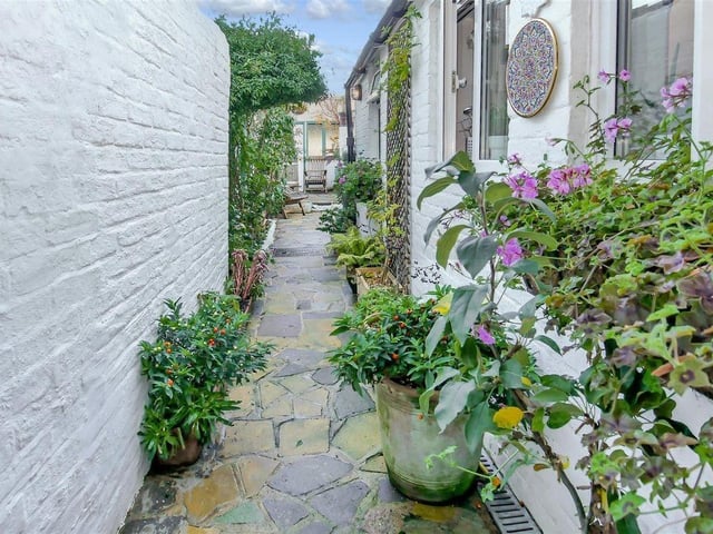 Doors from the dining area lead out to the garden