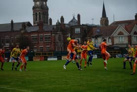 Eastbourne Town and Punjab United do battle at a dark and damp Saffrons | Picture: Josh Claxton