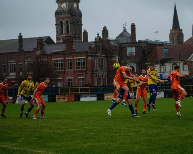 Eastbourne Town and Punjab United do battle at a dark and damp Saffrons | Picture: Josh Claxton