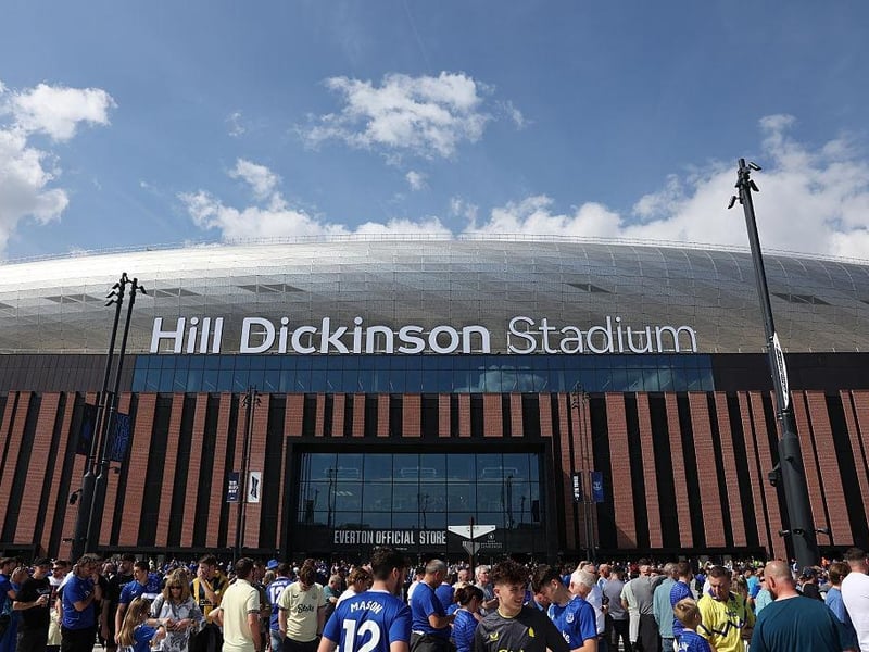 Fans arrive at the Hill Dickinson Stadium, the new home ground of Everton football club, ahead of the English Premier League football match between Everton and Brighton and Hove Albion