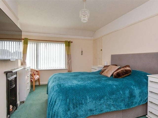 Two of the bedrooms have a fireplace