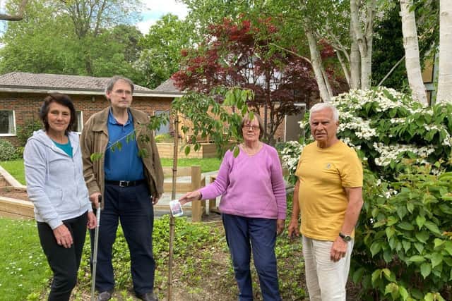 Members of the community garden team at Crawley URC after the planting of the tree