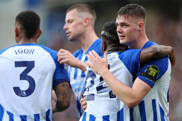 Evan Ferguson celebrates with teammate Simon Adingra after putting Brighton 1-0 up v Fulham - but the Seagulls could not go on to claim victory (Photo by Tom Dulat/Getty Images)