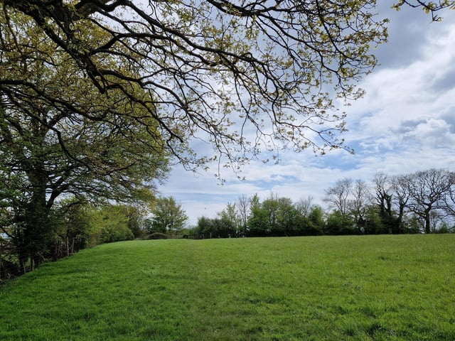 Follow the footpath across the fields
