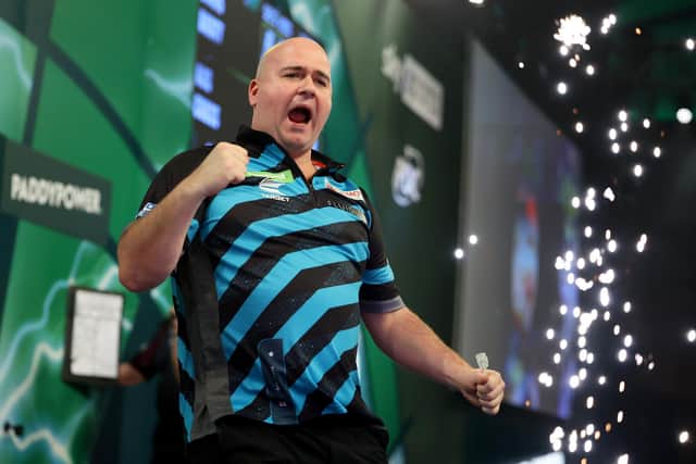 Rob Cross celebrates winning his quarter final match against Chris Dobey at Alexandra Palace (Photo by Tom Dulat/Getty Images)