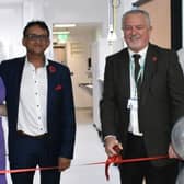 East Sussex Healthcare Trust Chairman, Steve Phoenix, cuts the ribbon to officially open the new cath lab. Picture: East Sussex NHS Trust