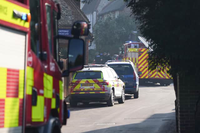 A huge emergency response has been reported in Nepcote Lane, Findon, with dozens of emergency service personnel at the scene. Photo: Eddie Mitchell