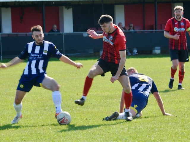 Action from Wick's home defeat to Godalming in the SCFL Division 1 at Crabtree Park