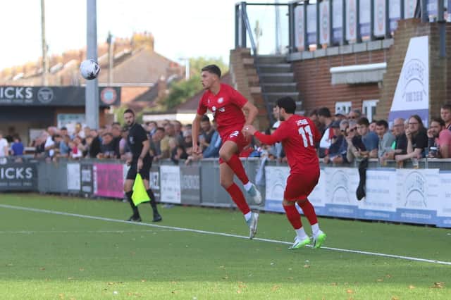 Worthing progressed to the FA Cup fourth qualifying round with a 2-1 win over Sussex rivals Whitehawk thanks to a Jake Robinson brace.