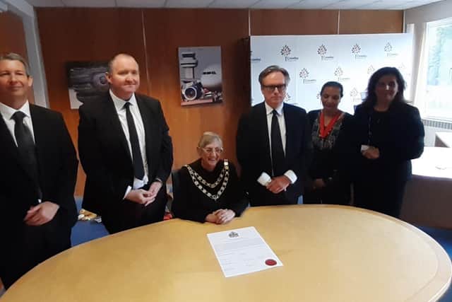 Cllr Duncan Jones, leader of the Conservative Party in Crawley, Crawley Borough Council leader Michael Jones, Mayor Jilly Hart, Henry Smith MP, deputy Mayor Tahira Rana and chief executive Natalie Brahma-Pearl all signed two versions of the Proclamation.