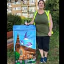 Artist Holly Sellors' with her design on the St John’s Road box on the corner with Church Close, Burgess Hill