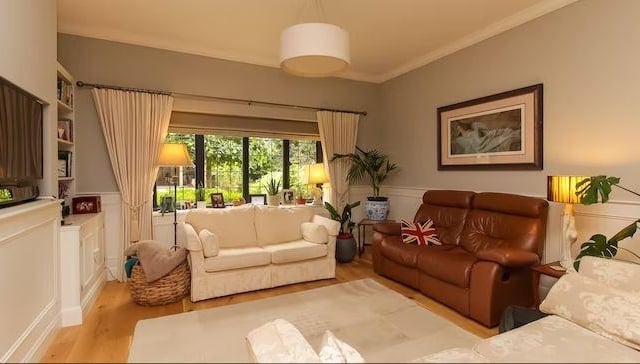 There is an open plan through lounge-dining room with plenty of space for sofas and chairs to relax in.