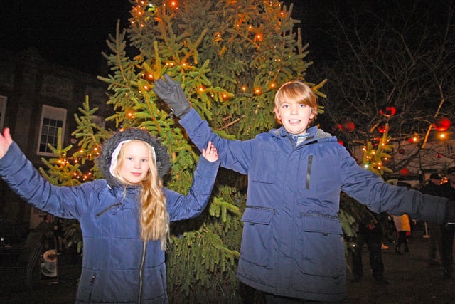 Pixie, 10, and Archie, 11, switched on the lights. Photo by Derek Martin Photography and Art.