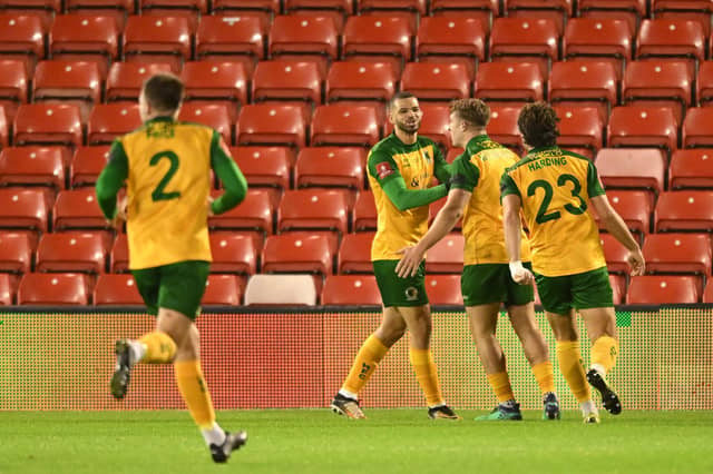 BARNSLEY, ENGLAND - NOVEMBER 03: Shamir Fenelon of Horsham celebrates his goal to make it 1-1 during the Emirates FA Cup First Round match between Barnsley and Horsham at Oakwell Stadium.