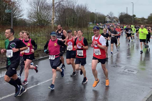 The Hastings Half Marathon field make their way along Harley Shute Road | Photo by Frank Copper.