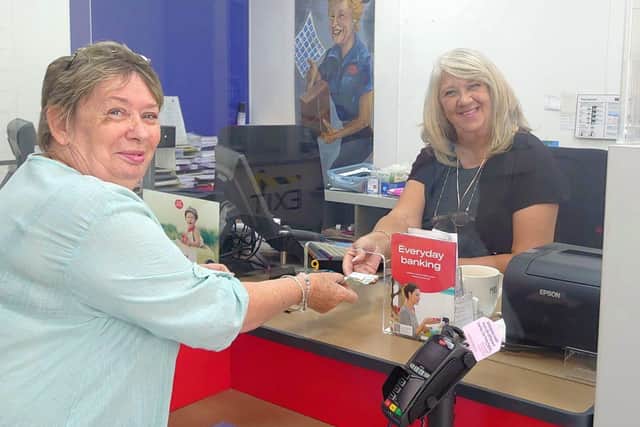 Town Cllr Mary Laxton and counter clerk at Hailsham Post Office