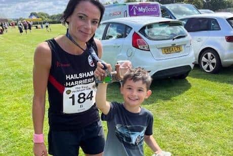 Lianne Leakey with her biggest fan at the end of her race | Contributed picture