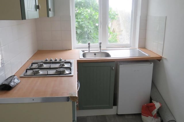 The fitted kitchen has sea views