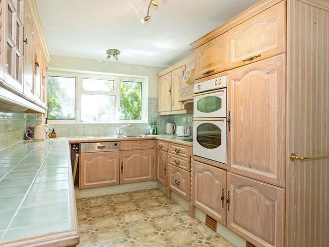 This substantial detached family house sits on the highest point in North Lancing, with grounds totalling 0.5 acres of land. Offers in the region of £1million are invited for this four-bedroom property at the foot of the South Downs National Park, with magnificent panoramic coastal views.