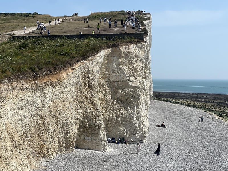 Shocking photos show sunbaskers standing near edge of cliffs at Birling Gap