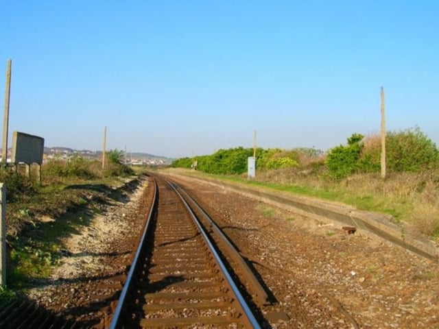 Bishopstone Beach Halt opened on 1 June 1864 and closed on 1 January 1942. The station was built on the Seaford Branch Line for residents of the Bishopstone and Tide Mills villages and located on the west side of Mill Drove. The company that operated the trains on opening was the London Brighton & South Coast Railway, later merged into the Southern Railway. The station was built primarily for the 60-100 workers at the mills. After the mills closed 1883 it became used mainly by holiday passengers