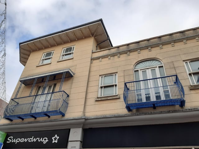 Balconies and balustrades above Superdrug