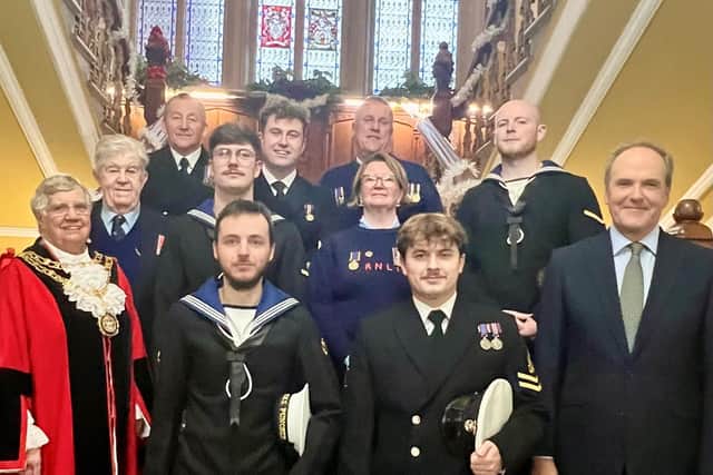 The Mayor of Eastbourne Councillor Margaret Bannister (left) with representatives from the Royal Navy and local seafaring groups after the re-signing ceremony at the Town Hall. Picture: Eastbourne Borough Council