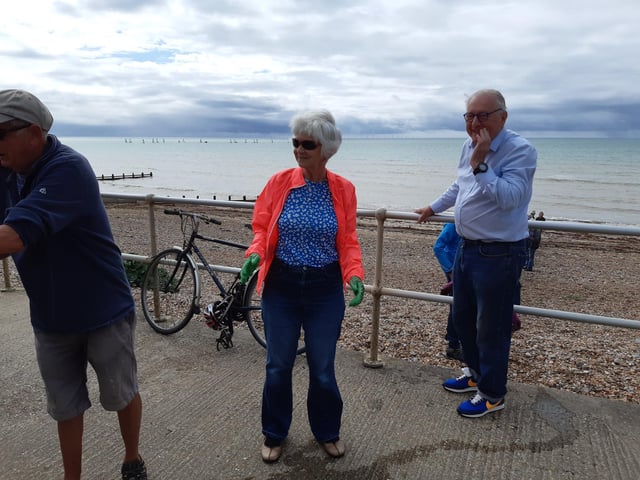 A bucket chain of volunteers from Ferring History Group and Ferring Conservation Group, including Worthing West MP Sir Peter Bottomley, form a bucket chain to bail out nine inches of water from the Ferring pillbox
